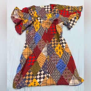 Umgee bell sleeve and patchwork mini dress
Size medium